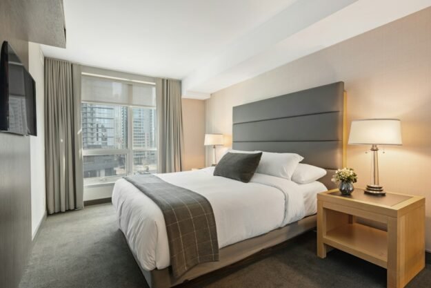 Hotel bedroom window dressing — representative interior photograph