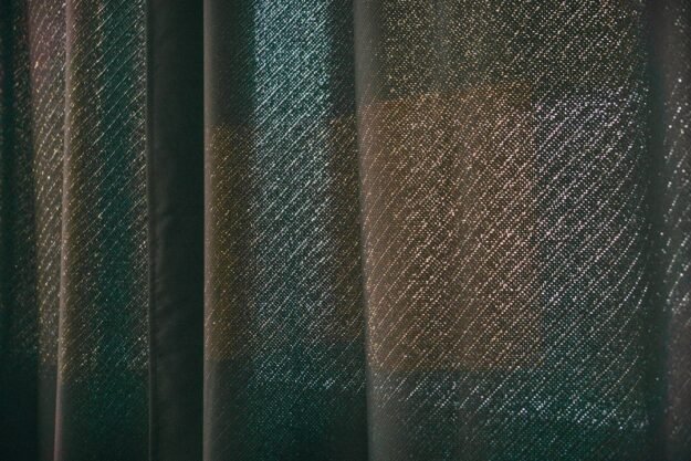 Close-up curtain texture and folds — representative textile photograph