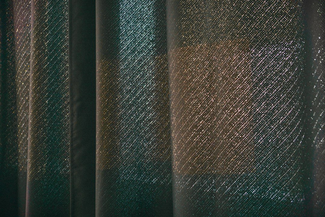 Close-up curtain texture and folds — representative textile photograph