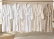 Illustrative collection of terry kimono, shawl-collar, hooded, waffle piqué and velour bathrobes