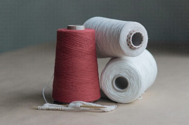 Bobbins of yarn — representative textile yarn photograph