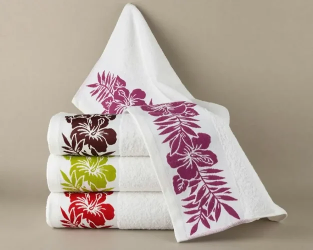 White towels with colourful floral embroidery